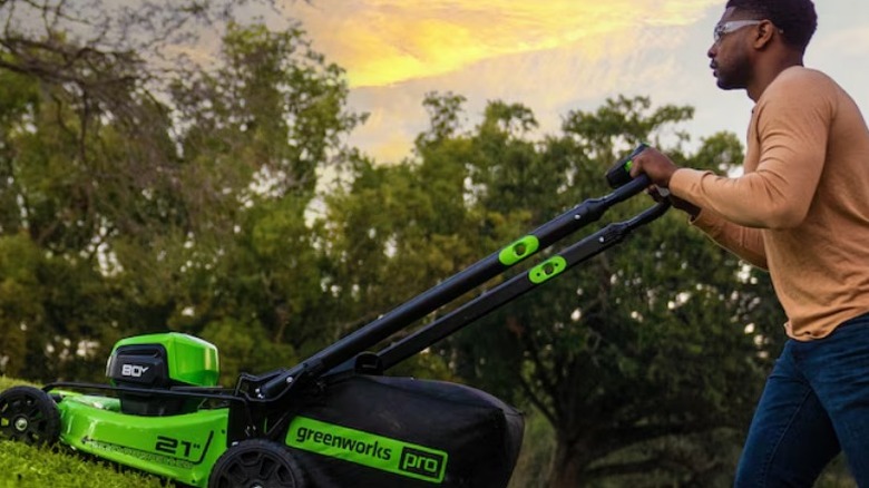 Person mowing lawn with Greenworks Pro 80V 21-inch 3-in-1 Self Propelled Mower