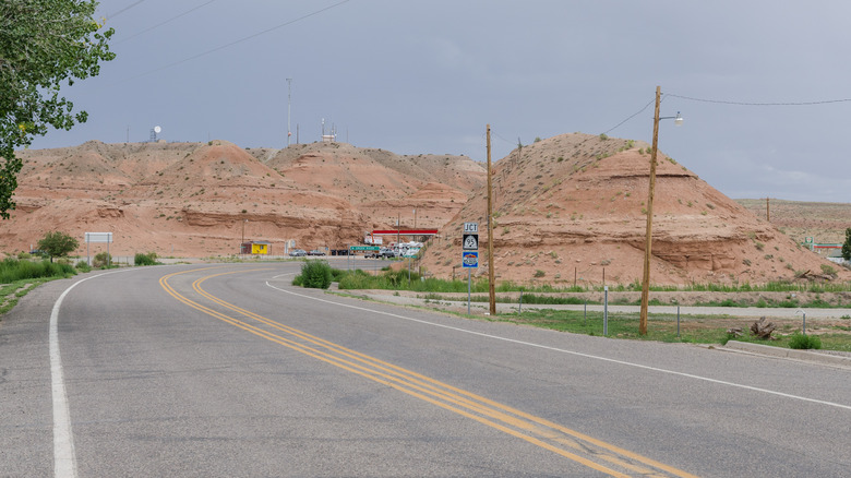 Utah State Route 24 in Hanksville, Utah. The junction with UT-95 is behind the hills