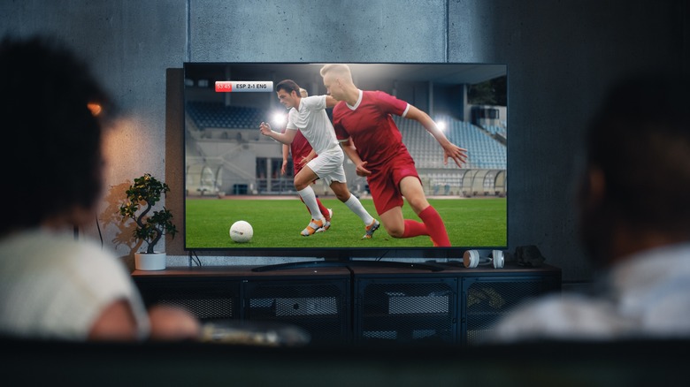 watching soccer on tv