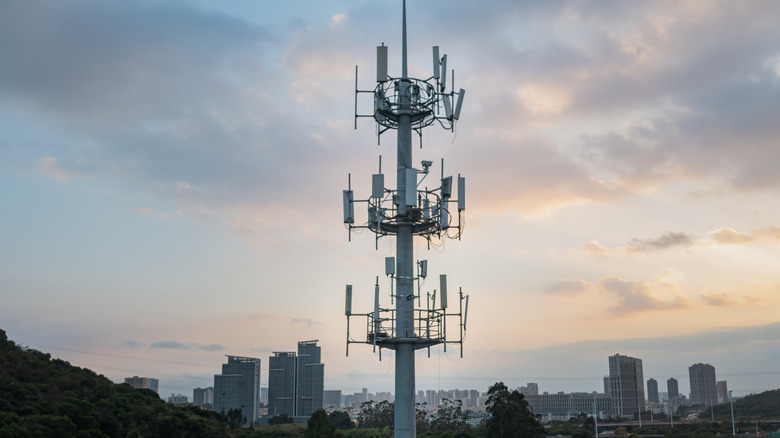 A 5G tower during a cloudy day