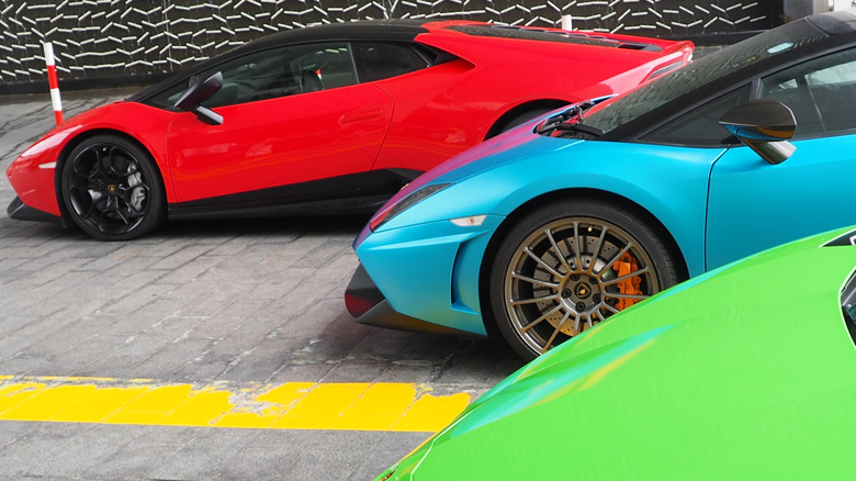 Parked group of supercars in bright colors