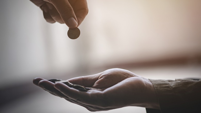 Person giving money