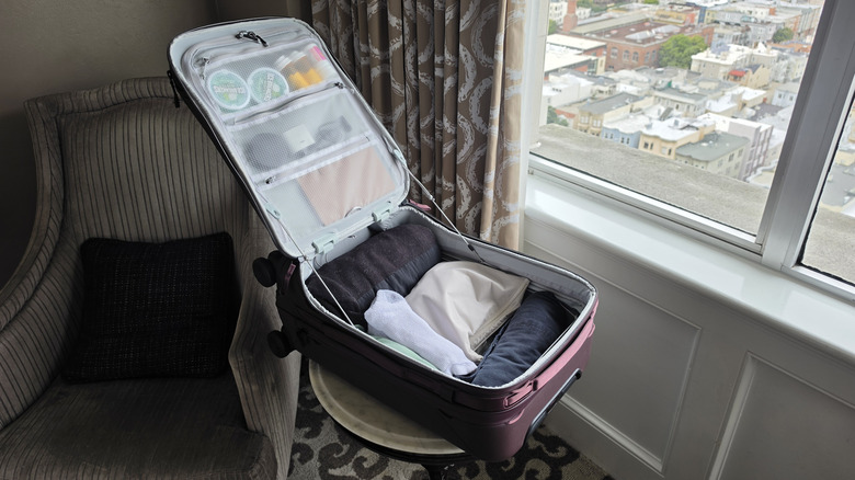 Peak Design Roller Pro suitcase on a table.