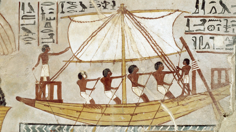 Ancient Egyptian ship with oars and sail