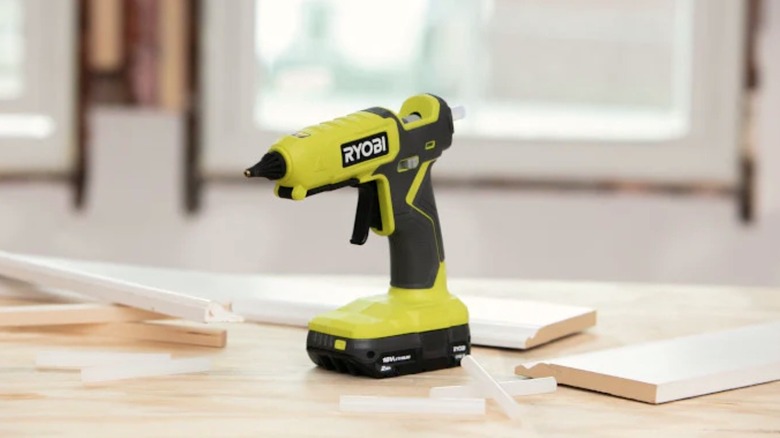Ryobi glue gun sitting on table top