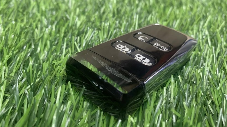 The Aston Martin Emotion Control Unit on some grass