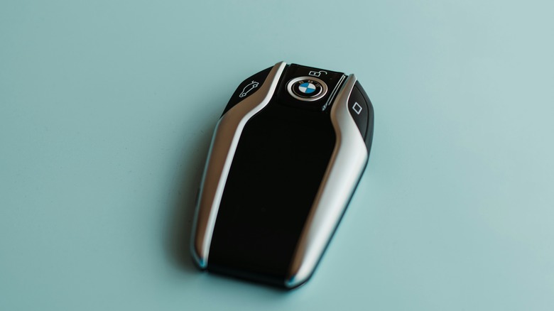 BMW's Display Key against a teal background, display off