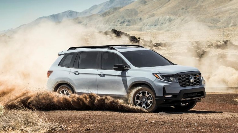 2022 Honda Passport driving through dirt