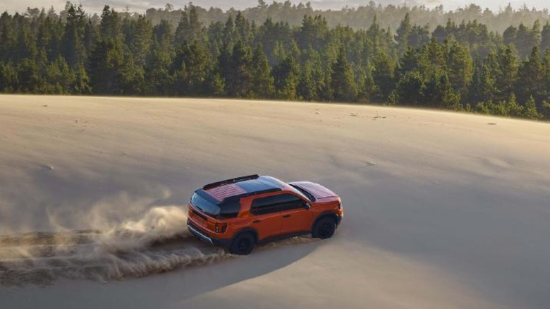 2026 Honda Passport driving through sand