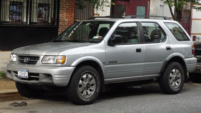 2nd Generation Honda Passport with facelift parked