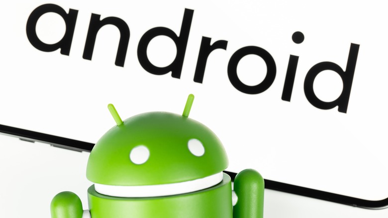 Android mascot in front of logo