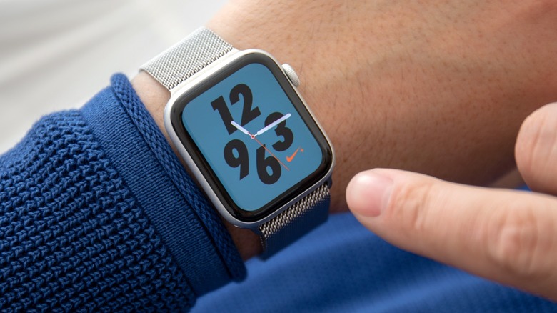 person wearing Apple Watch