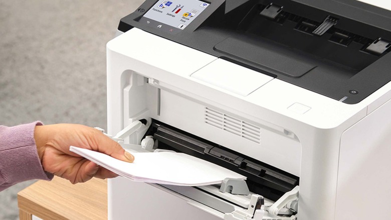 A person using a Brother printer