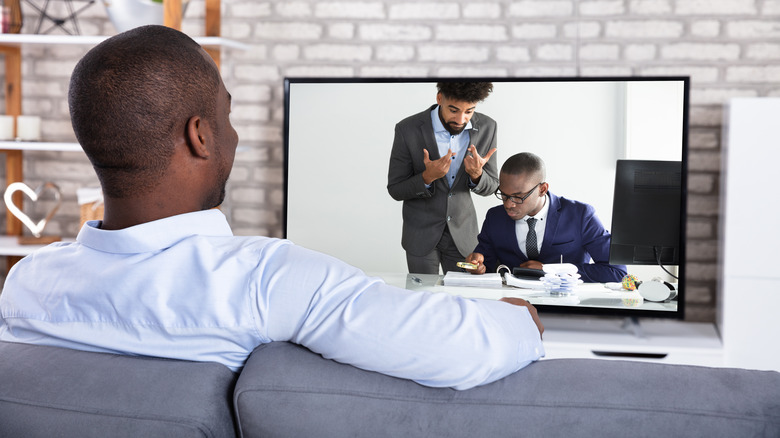 Guy enjoys some TV