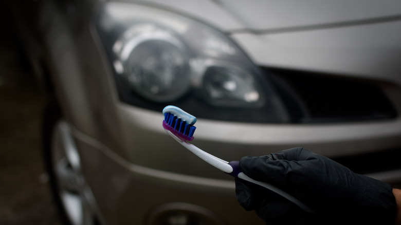 Cleaning headlights with toothpaste