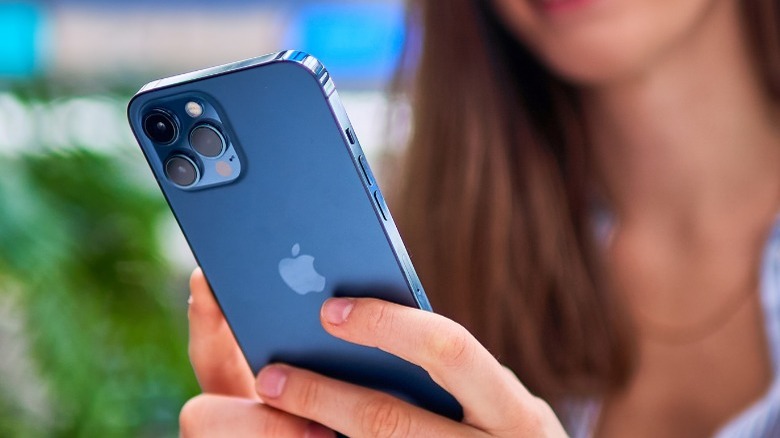 Person holding iPhone