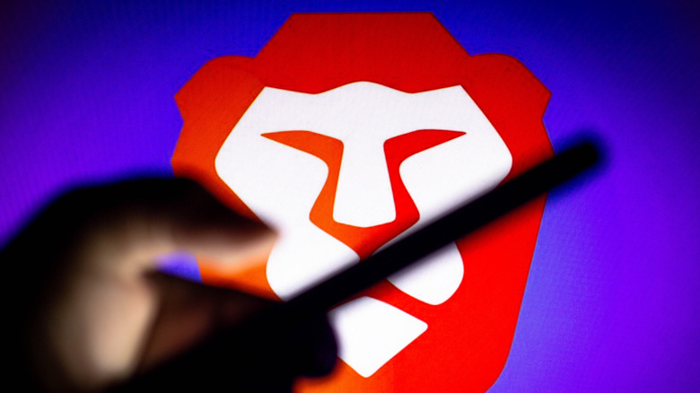 brave logo behind phone