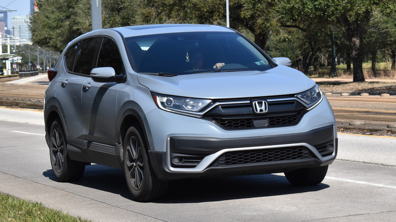 A blue Honda CR-V on a street.
