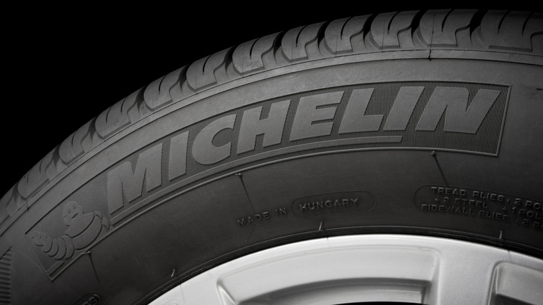 A close-up of Michelin tire, with its logo visible.