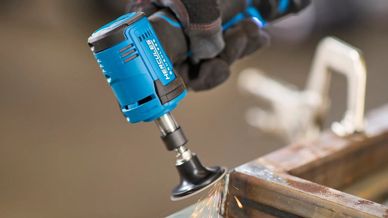 Sparks fly from a Hercules right angle die grinder