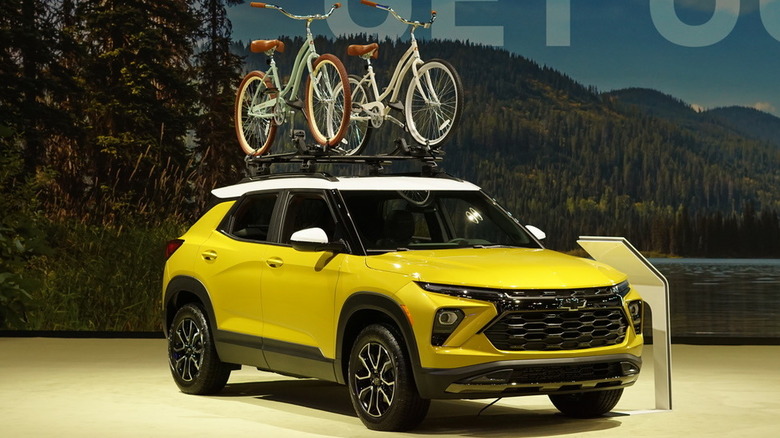 Chevy booth at the LA Auto Show with bikes on a roof rack