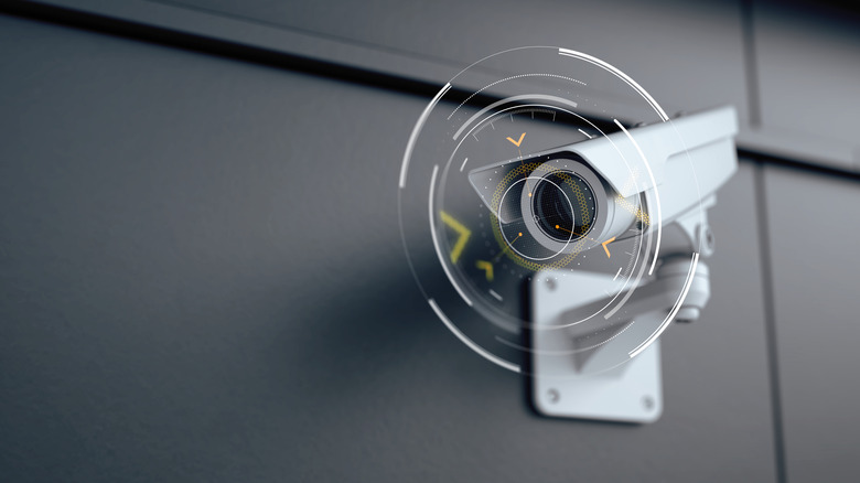 Security camera mounted on wall