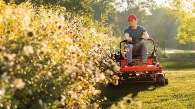 Troy-Bilt Mustang 42-inch 22 HP V-Twin Kohler 7000 Series Engine Dual Hydrostatic Drive Gas Zero Turn Riding Lawn Mower in use