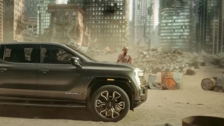 Denali vehicle pulls up by zombie in apocalypse