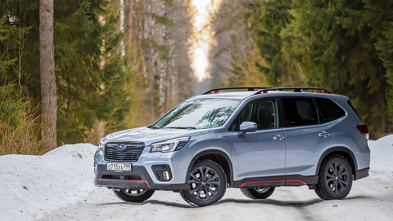 Subaru Forester parked on snowy road