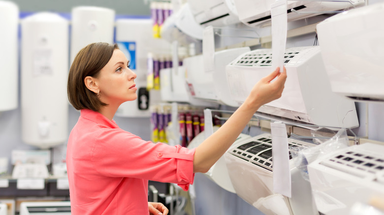 person browsing air conditioners