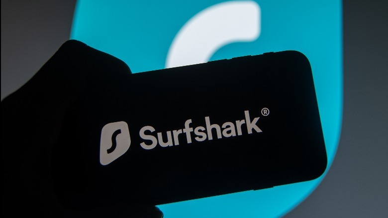 Surfshark logo on blacked out display screen.