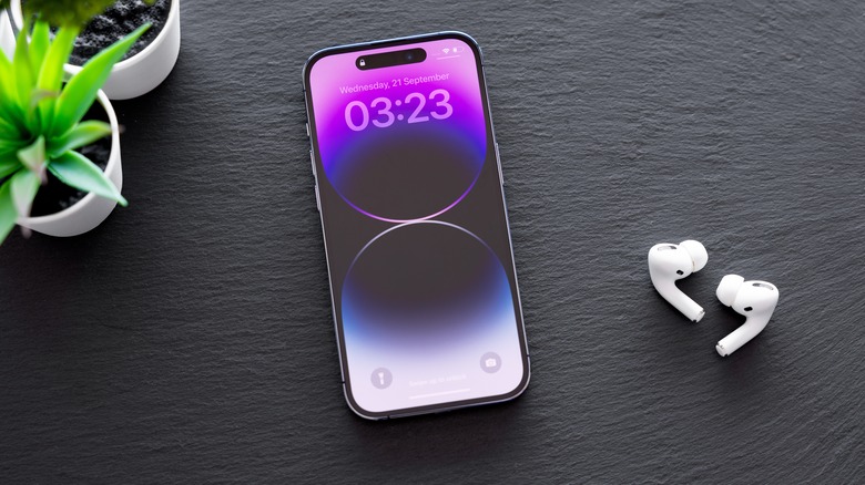 AirPods and iPhone on table