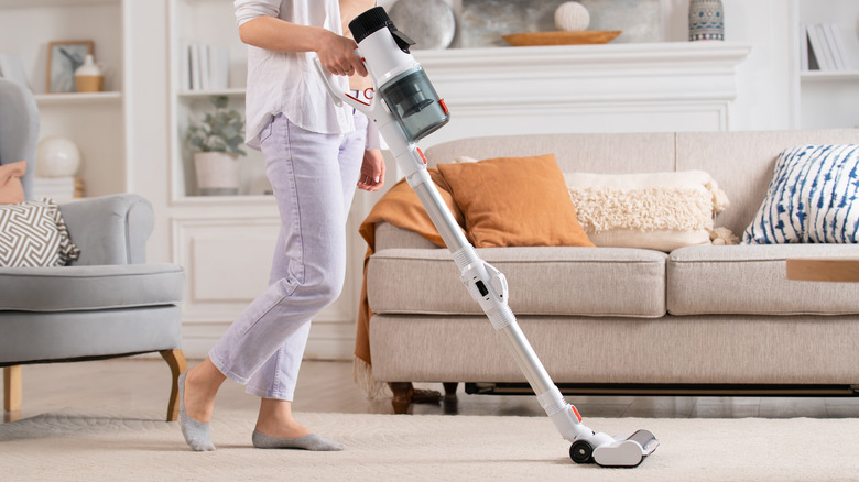 Person vacuuming