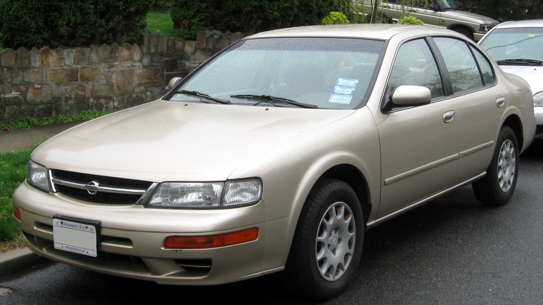 Late 1990s Nissan Maxima parked
