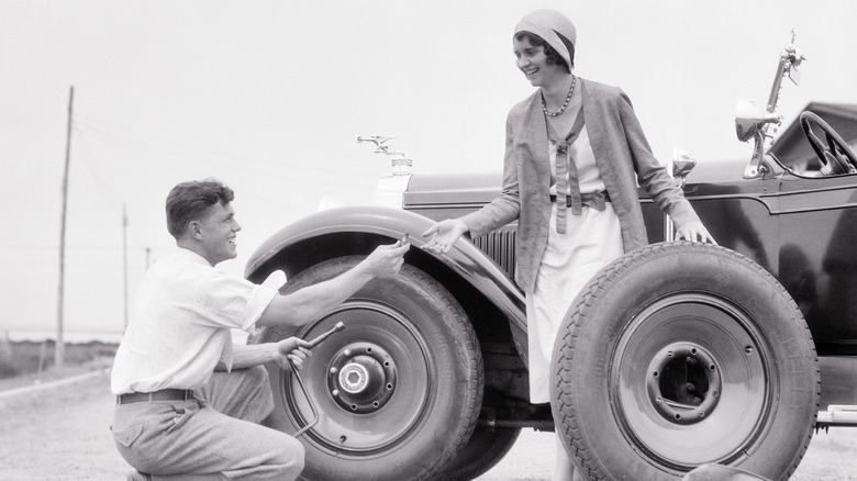 changing old car tire