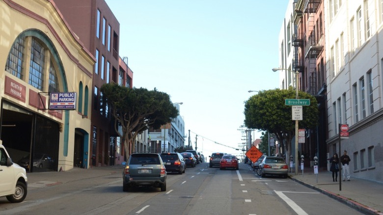 an image of cars at a steep intersection in san francisco california