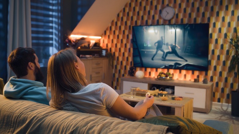 Family enjoying movie on a home theater.