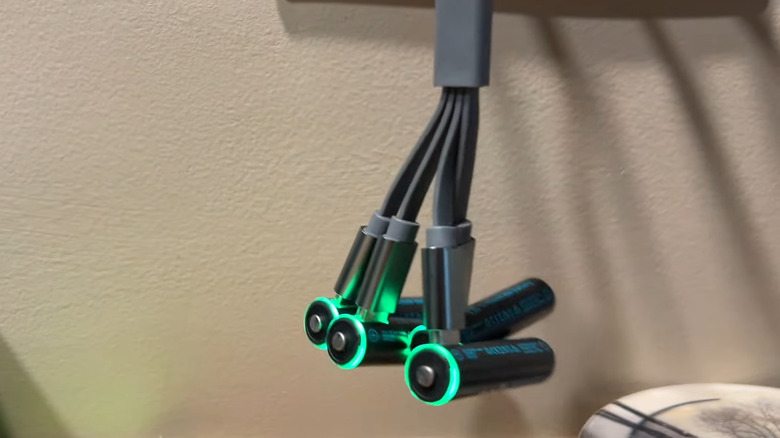 Four USB-C AA Batteries connected to charger