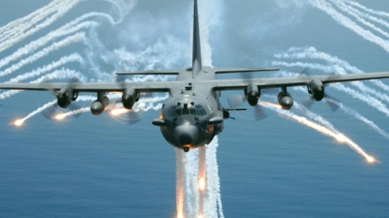 AC-130 flying firing its flares