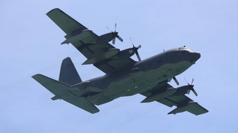 AC-130 flying in cloudless skies