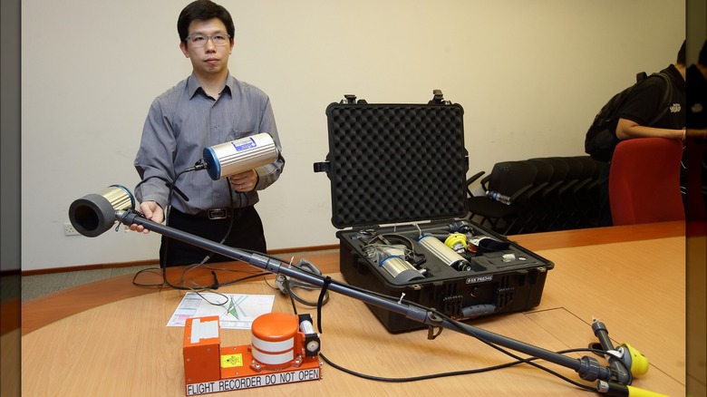 crash investigator demos the process of locating a black box