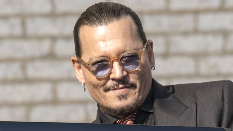 Johnny Depp entering car