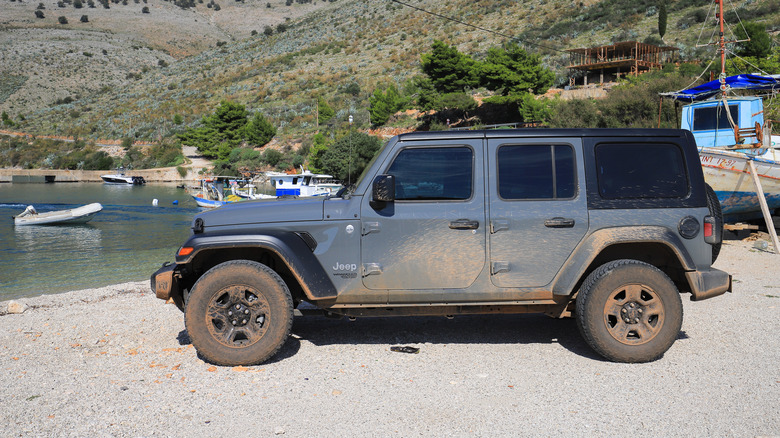 dirty SUV on the turf