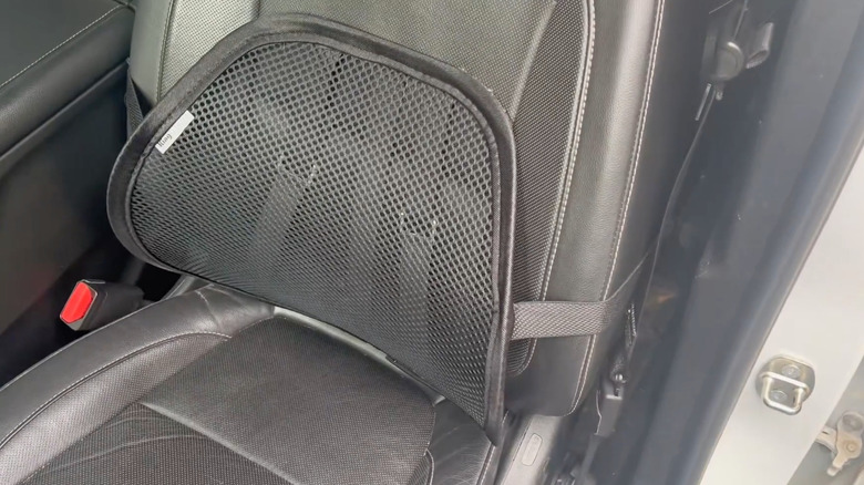The kingphenix Lumbar Support mounted on a car driver's seat