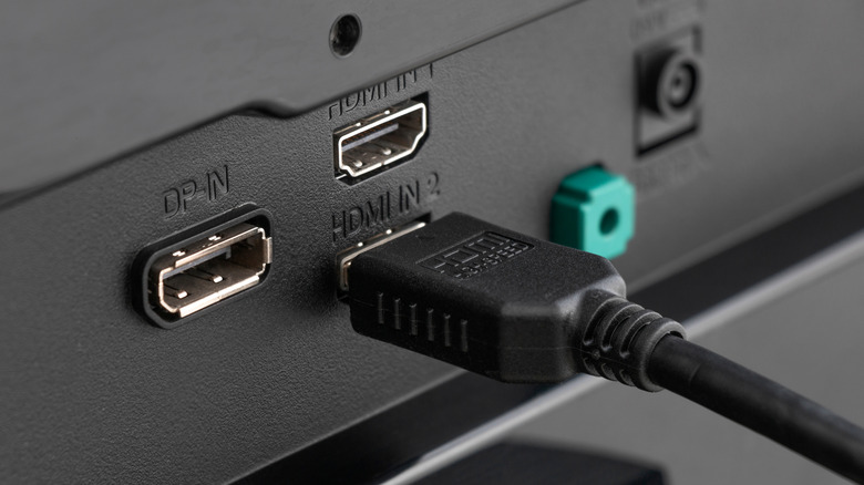 HDMI cable plugged into an HDMI port on a TV