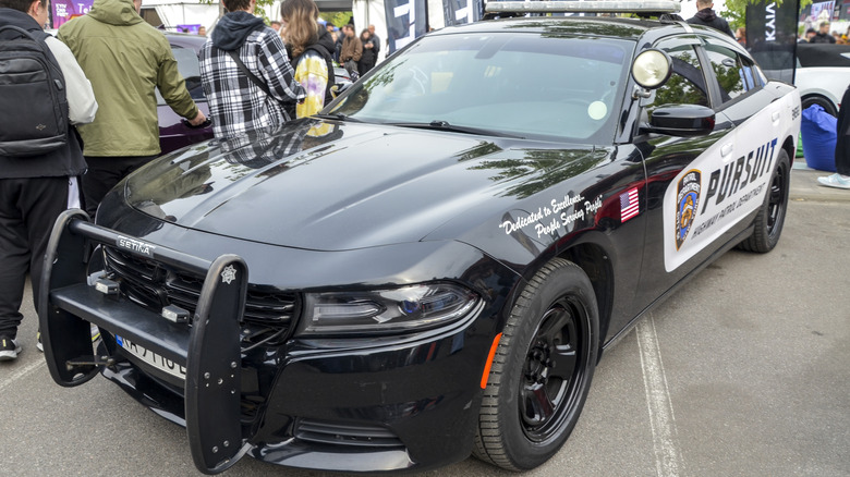 A black and white Dodge Charger Pursuit police car