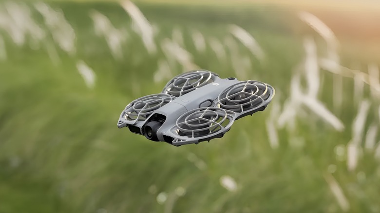 DJI Neo 2 flying across a field