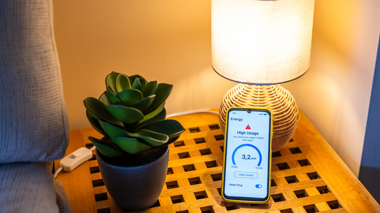 Smartphone showing high energy reading from a smart plug