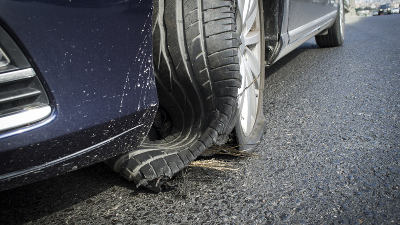 tread falling off of tire after explosion on highway