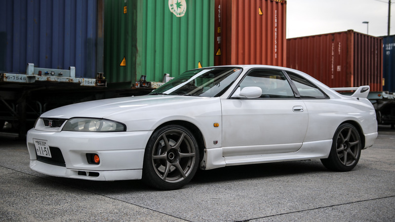 Nissan R33 Skyline GT-R by a harbor